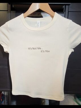 "It's Not Me...It's You" Bella + Canvas Cream Graphic Baby Tee.